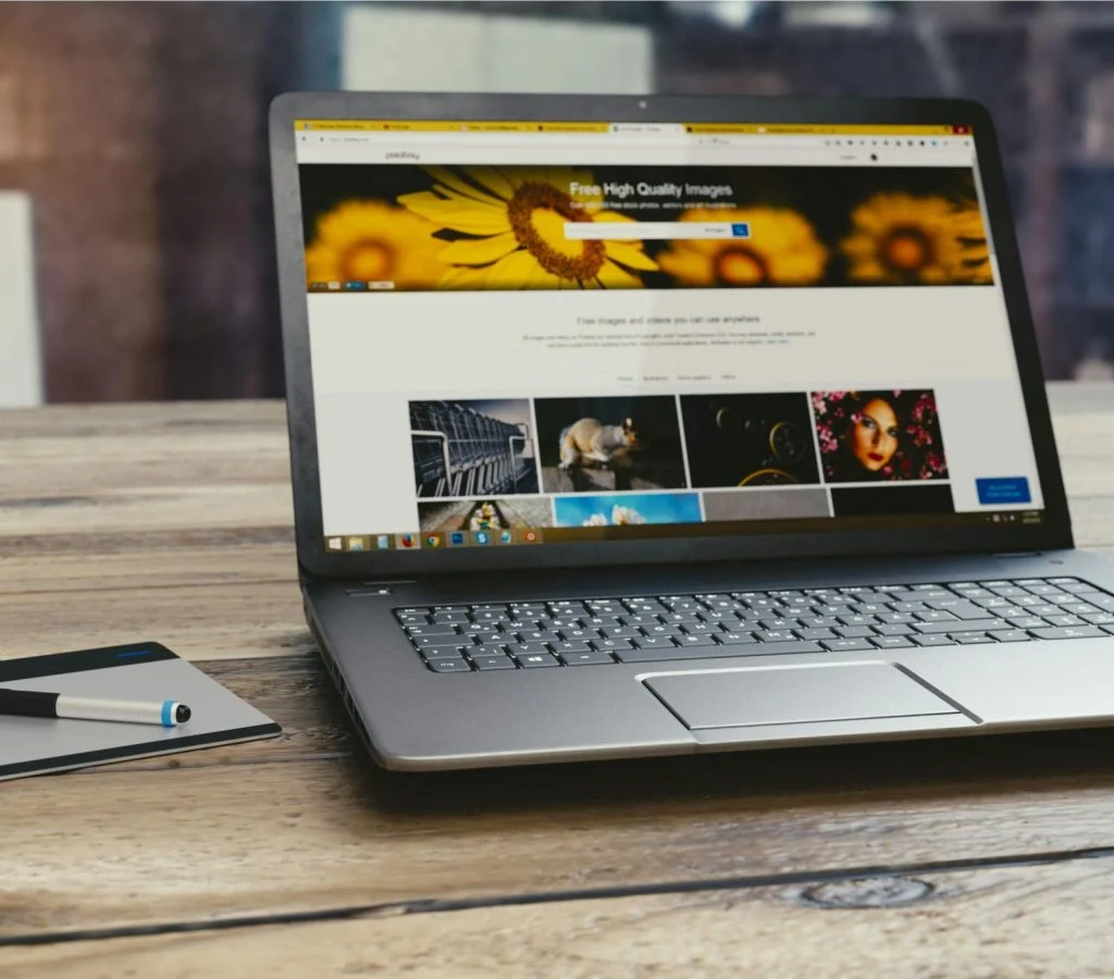 Person checking laptop specifications before buying