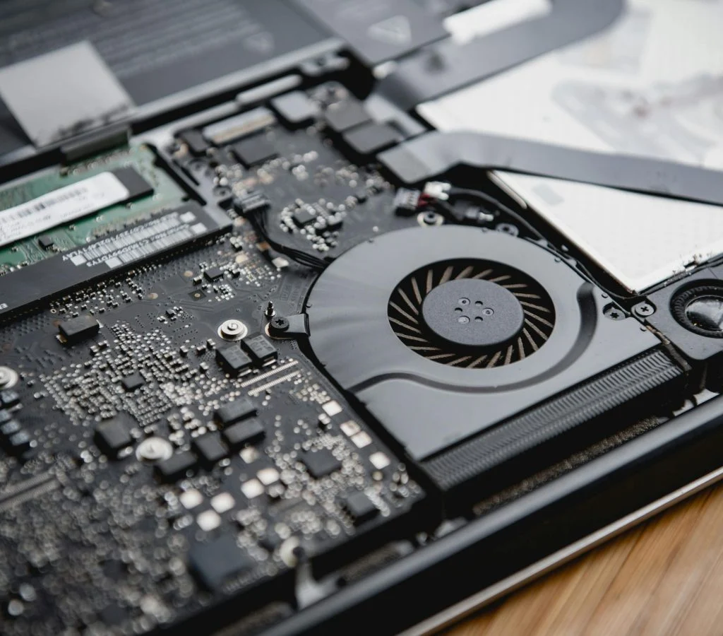 Laptop with a dusty fan and vents