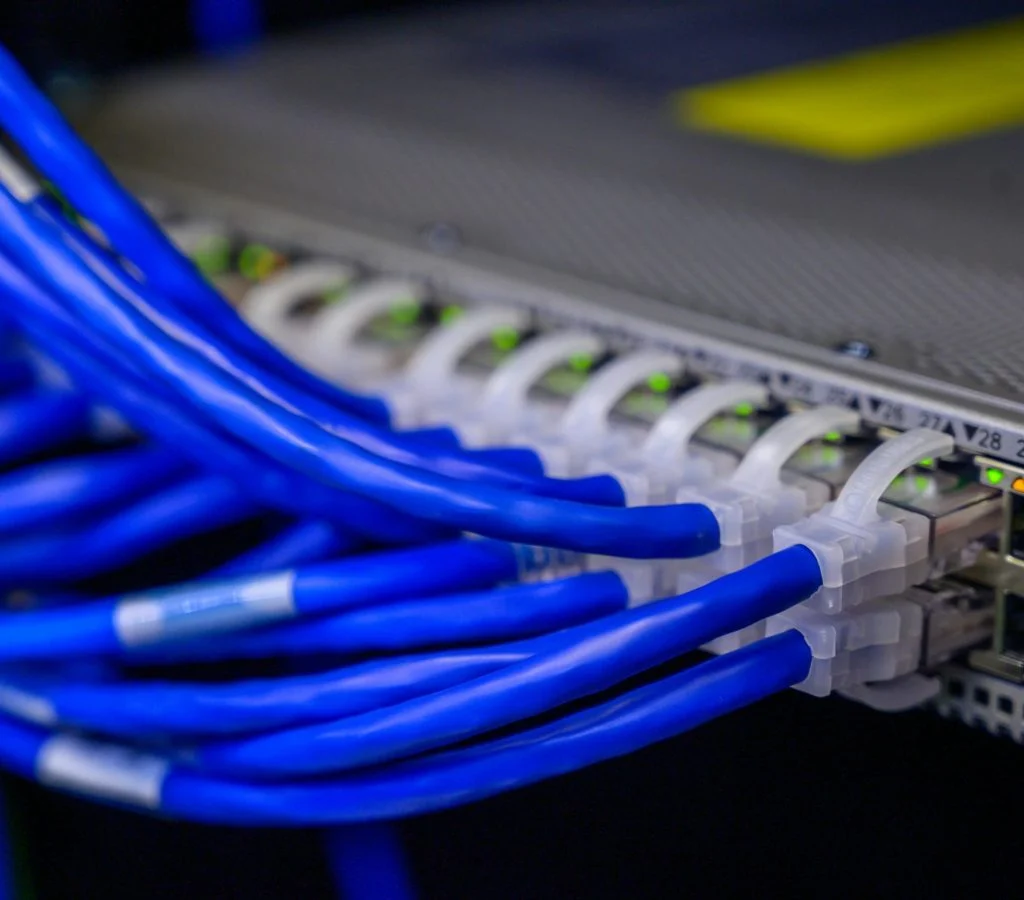 A network card being installed into a PC Ethernet port