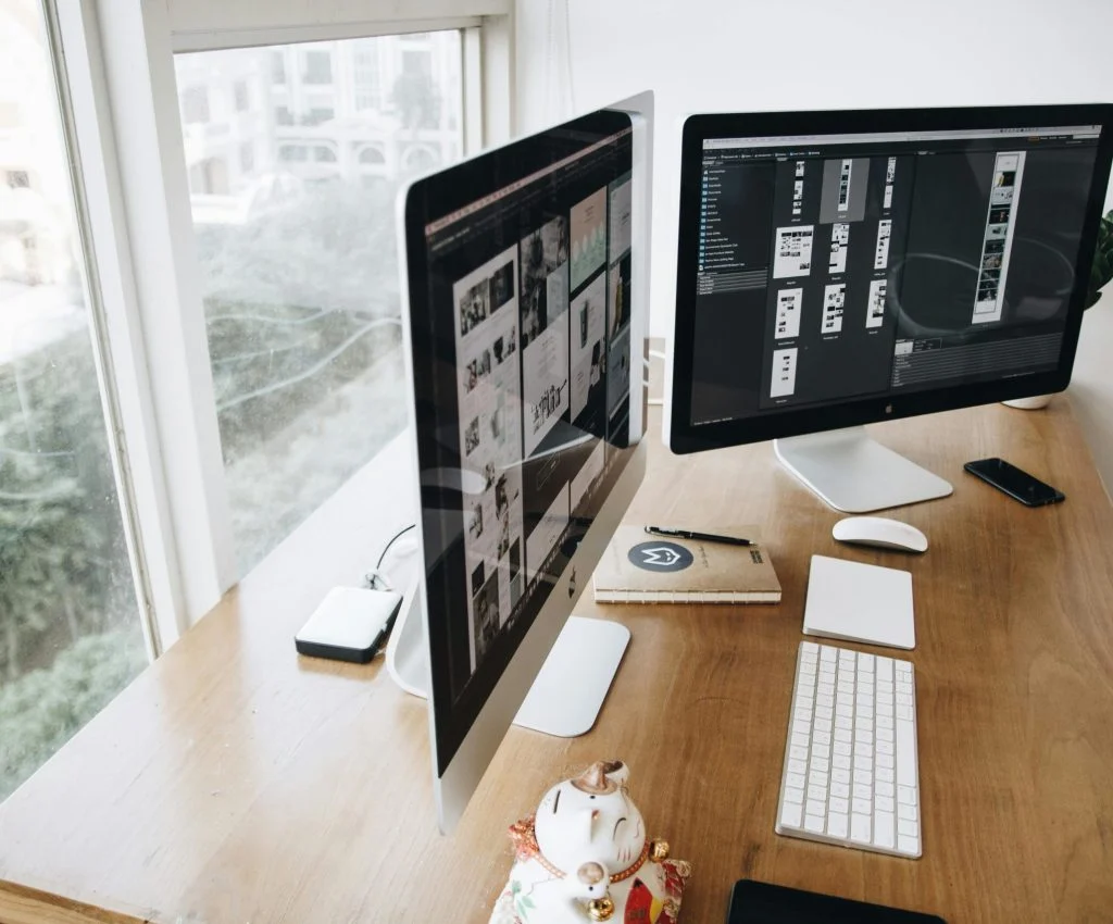A clean and organized computer setup with a desktop, keyboard, and monitor