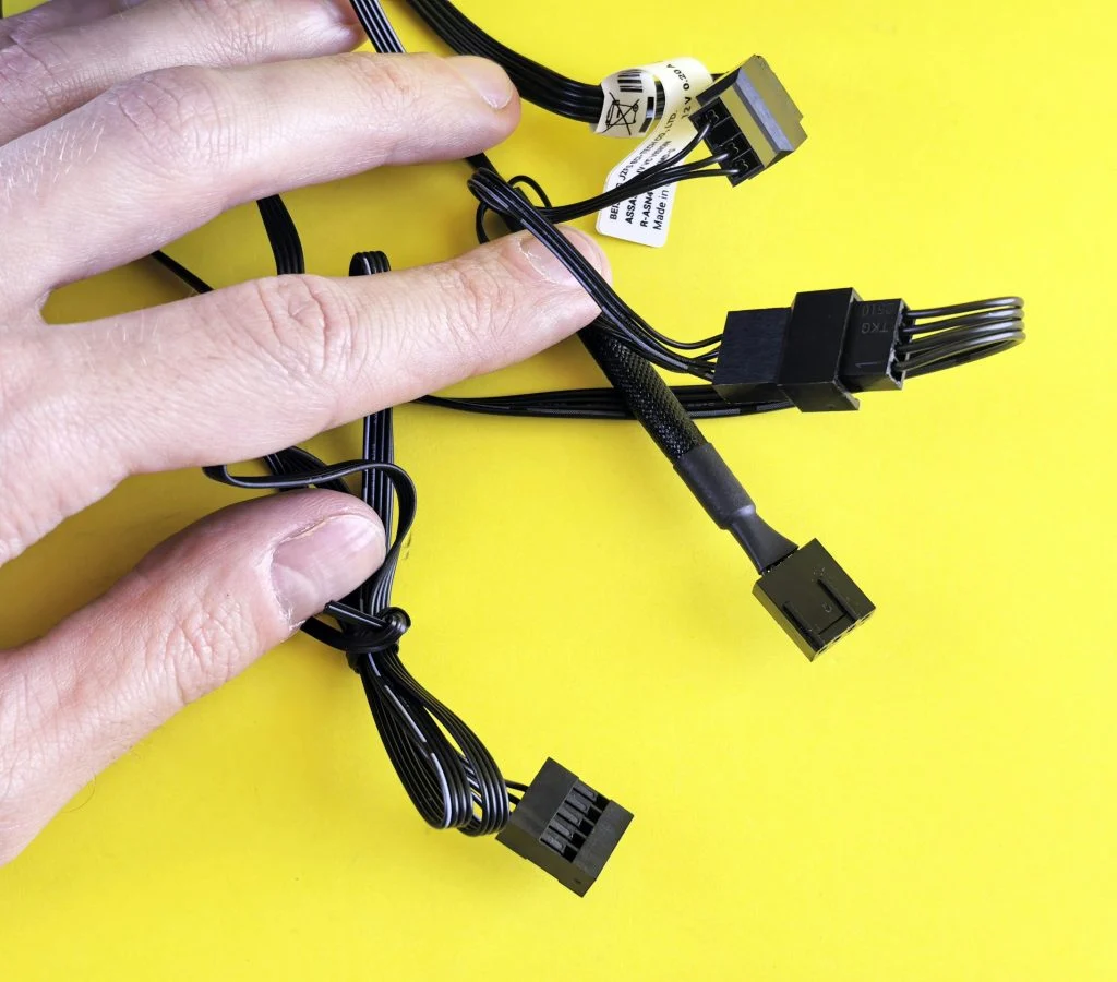 PC builder wearing an anti-static wrist strap