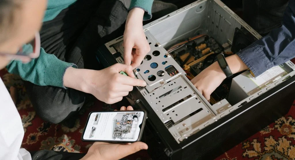 A person looking confused at PC hardware components
