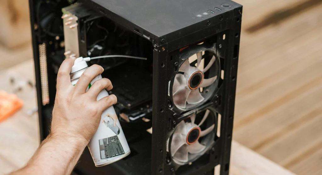 PC hardware with dust and dirt being cleaned to improve airflow and performance