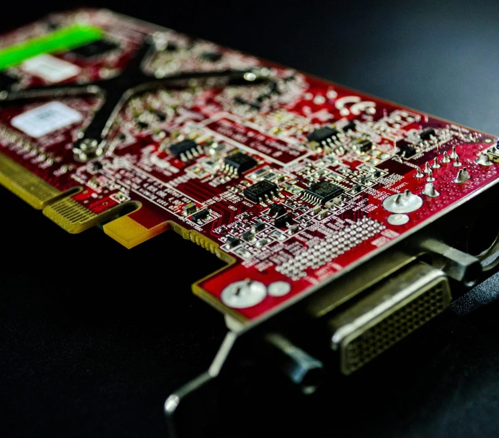 A graphics card being installed on a motherboard