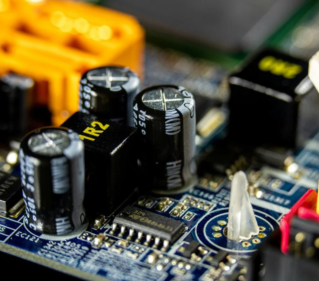 A computer motherboard with various components and sockets