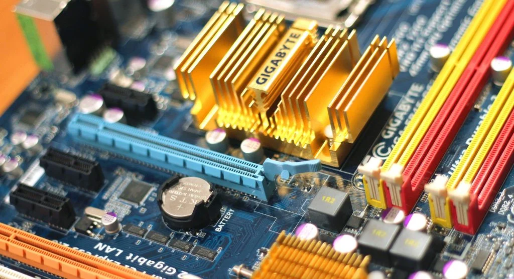 Computer cooling system with fans and heat sinks