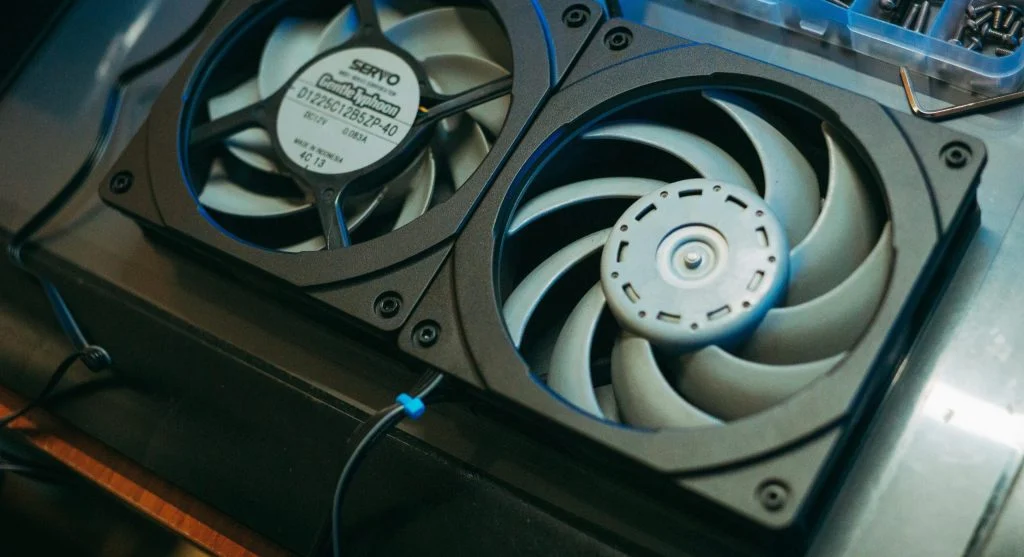 Laptop on a cooling pad with a quiet fan