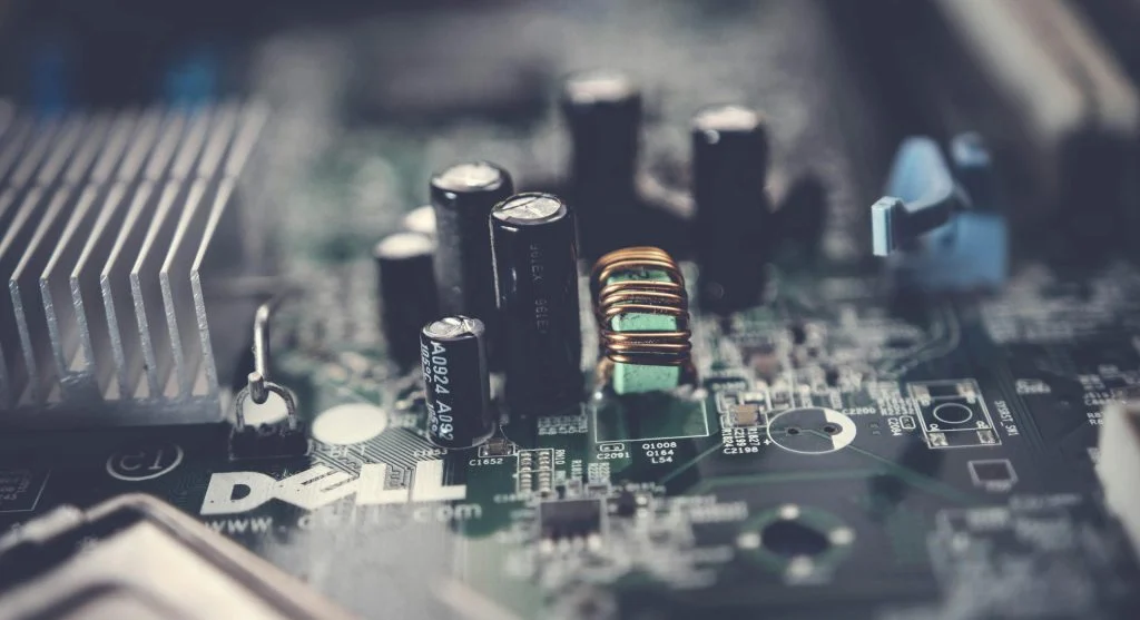 A motherboard with various PC components connected