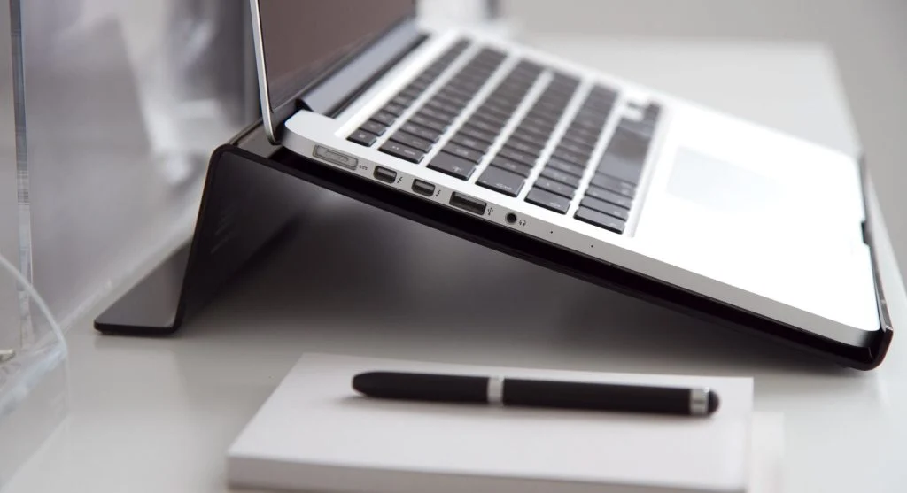 A side-by-side comparison of a laptop and desktop computer