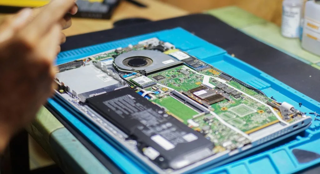 Person assembling computer components