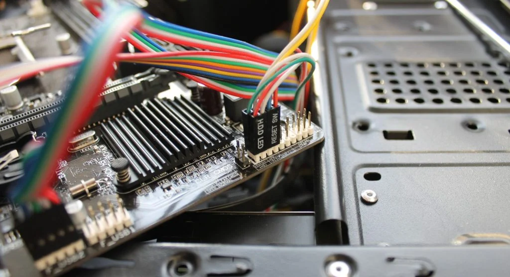 Power supply unit cables connected to a PC motherboard